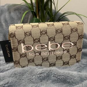 bebe Beige and Brown Monogram Crossbody Bag with Pink Logo